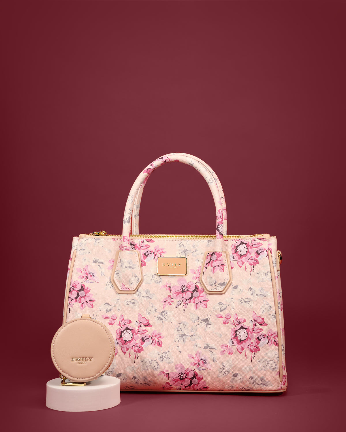 Printed zip-top tote with rolled handles, gold zip, and round coin purse — Emily Loran PH