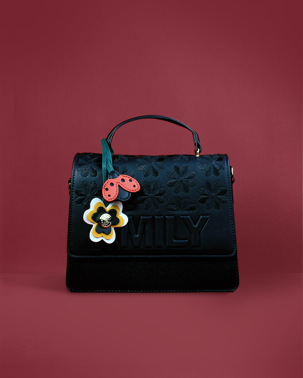 Flap satchel with tone-on-tone floral embossing and keepsake charms — Emily Loran PH