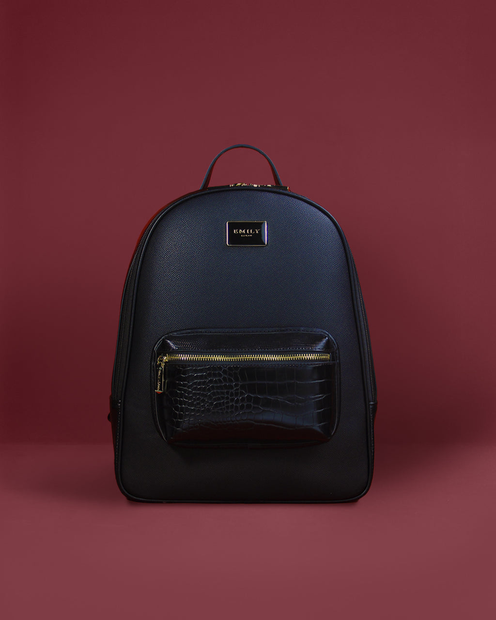 Structured saffiano-look backpack with glossy croc-emboss front pocket and gold plaque — Emily Loran PH
