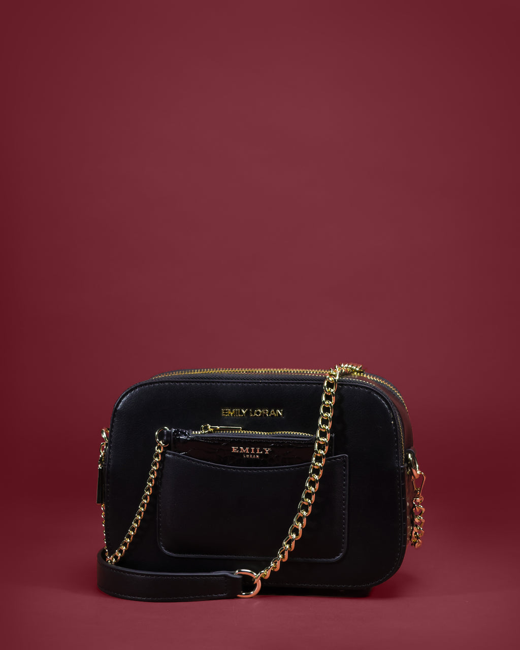 Sleek rounded crossbody with draped gold-tone chain strap and slip pocket — Emily Loran PH