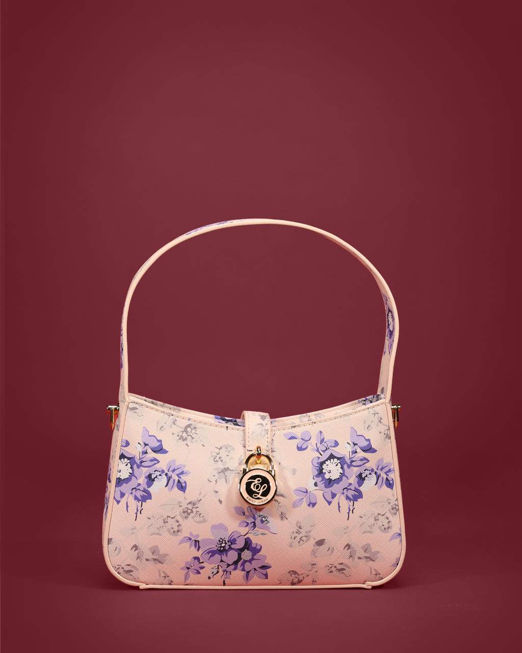 Soft shoulder baguette with watercolor-style print, front tab, and EL medallion charm — Emily Loran PH